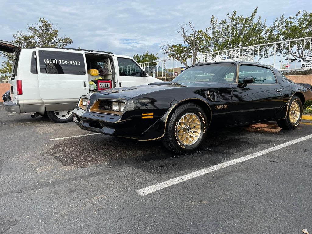 Camacho's Mobile Detailing with Black Trans Am